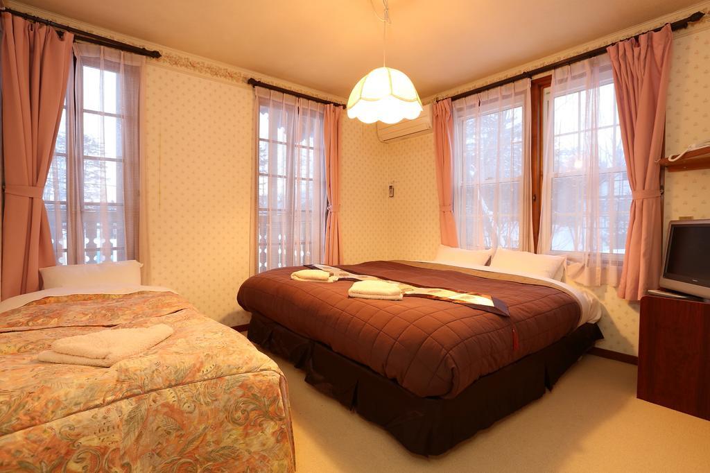 Bed and Breakfast Alpine Wind Хакуба-Мура Номер фото