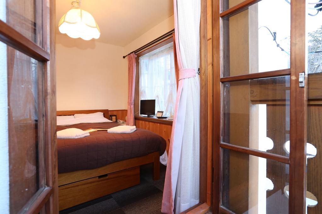 Bed and Breakfast Alpine Wind Хакуба-Мура Номер фото