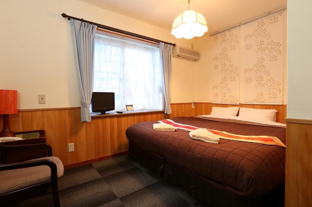 Bed and Breakfast Alpine Wind Хакуба-Мура Номер фото