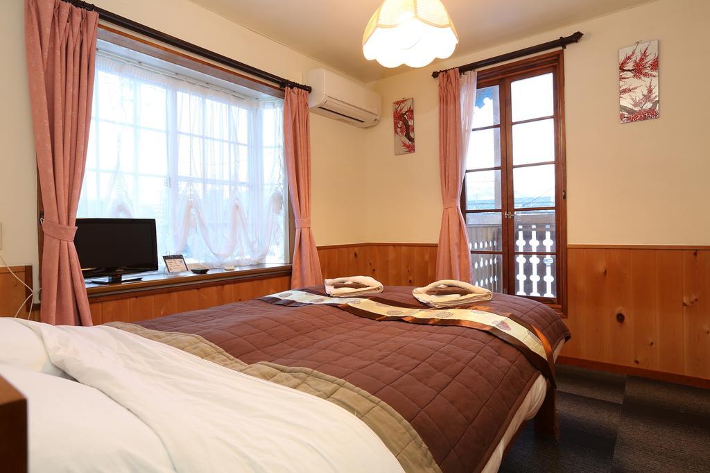 Bed and Breakfast Alpine Wind Хакуба-Мура Номер фото